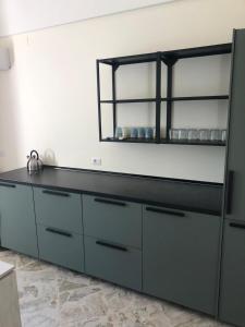 Η κουζίνα ή μικρή κουζίνα στο Domus Mea
