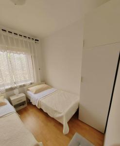 Postel nebo postele na pokoji v ubytování Guesthouse Resan
