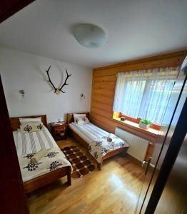 Łóżko lub łóżka w pokoju w obiekcie Apartament z widokiem na góry - Split AC, Private Terrace, Private Parking