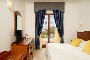 TV a/nebo společenská místnost v ubytování Hotel Relax