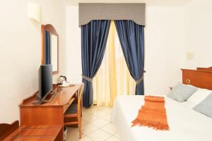 Postel nebo postele na pokoji v ubytování Hotel Relax