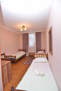 Voodi või voodid majutusasutuse Hotel Nikea Paradiso toas