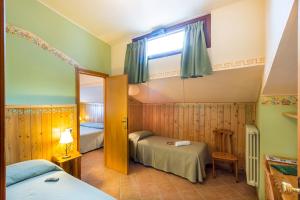 Postel nebo postele na pokoji v ubytování Hotel Trieste + 64 fotografií