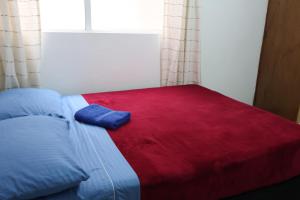 Postel nebo postele na pokoji v ubytování Living Poblado Manila 3028 Habitación Doble