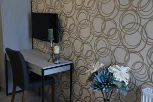 TV a/nebo společenská místnost v ubytování Hotel Saguramo Bliss