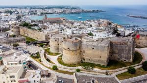 an aerial view of a city with a castle at Il Giardino Segreto in Maglie +21 photos