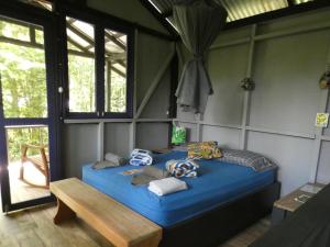 Postel nebo postele na pokoji v ubytování Yatama Rainforest Ecolodge
