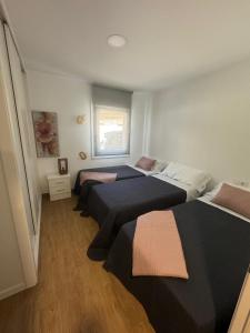 Ένα ή περισσότερα κρεβάτια σε δωμάτιο στο Casa Amieiro