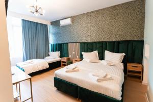 Postel nebo postele na pokoji v ubytování Central Rooms