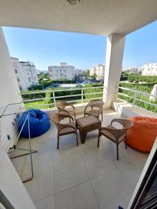 Balkón nebo terasa v ubytování Amwaj Resort امواج الساحل الشمالى 2 نوم 2 حمام