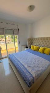 Ένα ή περισσότερα κρεβάτια σε δωμάτιο στο Villa Sol y Mar