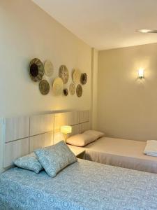 Кровать или кровати в номере De la Mora Hostal