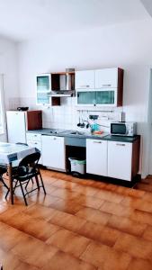 Kuchyň nebo kuchyňský kout v ubytování A casa di Pintus