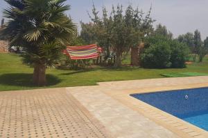 Swimming pool sa o malapit sa Gîte ferme avec piscine privée