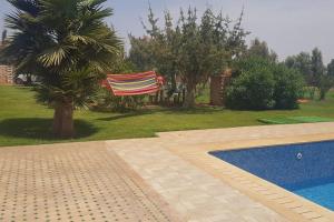 Swimming pool sa o malapit sa Gîte ferme avec piscine privée