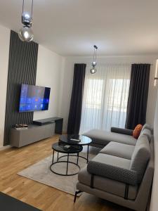 TV a/nebo společenská místnost v ubytování Apartman Sarah