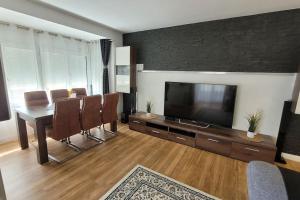 TV a/nebo společenská místnost v ubytování Para un descanso total 1
