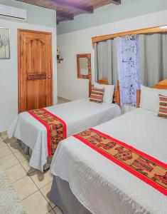 Krevet ili kreveti u jedinici u objektu Hotel Itzae