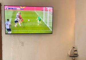 TV a/nebo společenská místnost v ubytování Hermosa casa frente a la playa