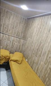 Ένα ή περισσότερα κρεβάτια σε δωμάτιο στο bangalow sidrafood