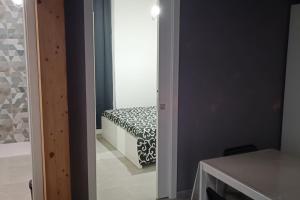 Postel nebo postele na pokoji v ubytování Oasi delle Querce Luxury Home