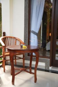 Posezení v ubytování Alit Bungalow Ubud