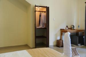 Postel nebo postele na pokoji v ubytování Alit Bungalow Ubud