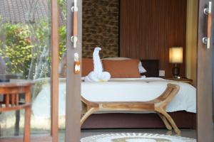 Balkón nebo terasa v ubytování Alit Bungalow Ubud