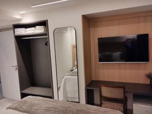 TV a/nebo společenská místnost v ubytování Apto 203 Legacy Suítes