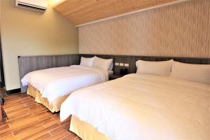 Letto o letti in una camera di Kinmen Yu Yuan