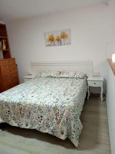 Ένα ή περισσότερα κρεβάτια σε δωμάτιο στο Apartament Playa de la Garita