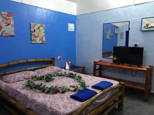 TV a/nebo společenská místnost v ubytování Sun House Rental