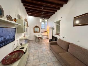 Χώρος καθιστικού στο Siroco Deluxe House