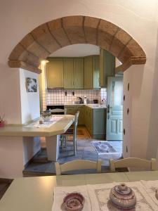 Η κουζίνα ή μικρή κουζίνα στο Siroco Deluxe House