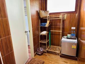 Kuchyň nebo kuchyňský kout v ubytování Bann Klong Jao Homestay