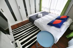 Katil atau katil-katil dalam bilik di QU302 Edogawa Japanese Style has direct access to Akihabara and Shinjuku, with convenient free WiFi +23 gambar