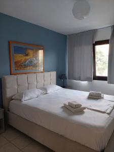 Posteľ alebo postele v izbe v ubytovaní Dora's House comfortable apartment with a yard and view