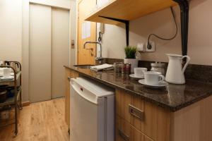 Kuhinja oz. manjša kuhinja v nastanitvi AinB Picasso-Corders Apartments