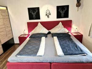 Postel nebo postele na pokoji v ubytování Apartments Fasl