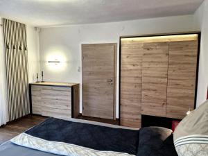Postel nebo postele na pokoji v ubytování Apartments Fasl