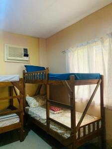 Giường trong phòng chung tại Francis Dale Lodge L4 +18 ảnh
