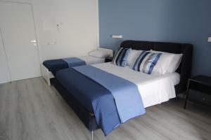 Postel nebo postele na pokoji v ubytování Villa Capodacqua