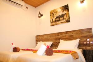 Voodi või voodid majutusasutuse Rustic Villa toas