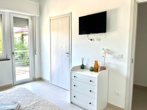 En TV eller et underholdningssystem på Il Vigneto Suite