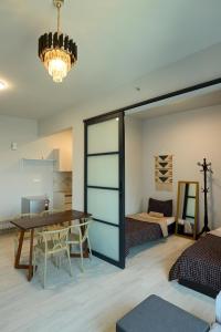 Postel nebo postele na pokoji v ubytování Jesselton Quay Seaview Homestay near Suria Sabah by StayPlace