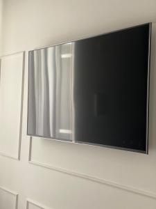 TV a/nebo společenská místnost v ubytování Vicolo delle Belle Suite