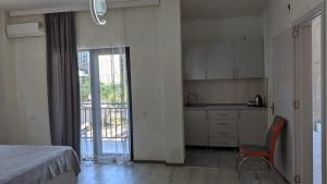 Voodi või voodid majutusasutuse Hotel Palm Gonio toas