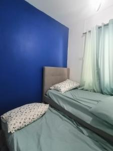 Giường trong phòng chung tại GMM Homestay +3 ảnh