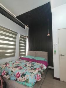 Giường trong phòng chung tại GMM Homestay