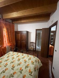 Postel nebo postele na pokoji v ubytování Casa di nonno Agostino
